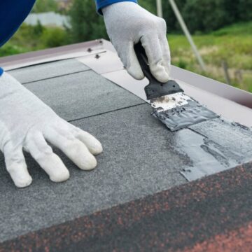 close-up, application of mastic on the roof, on the soft roof, b